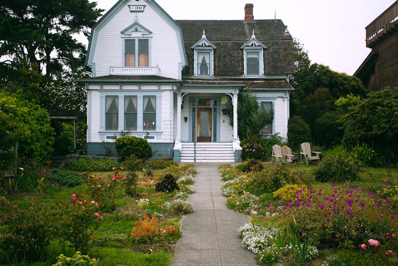 a house with many front yard plants